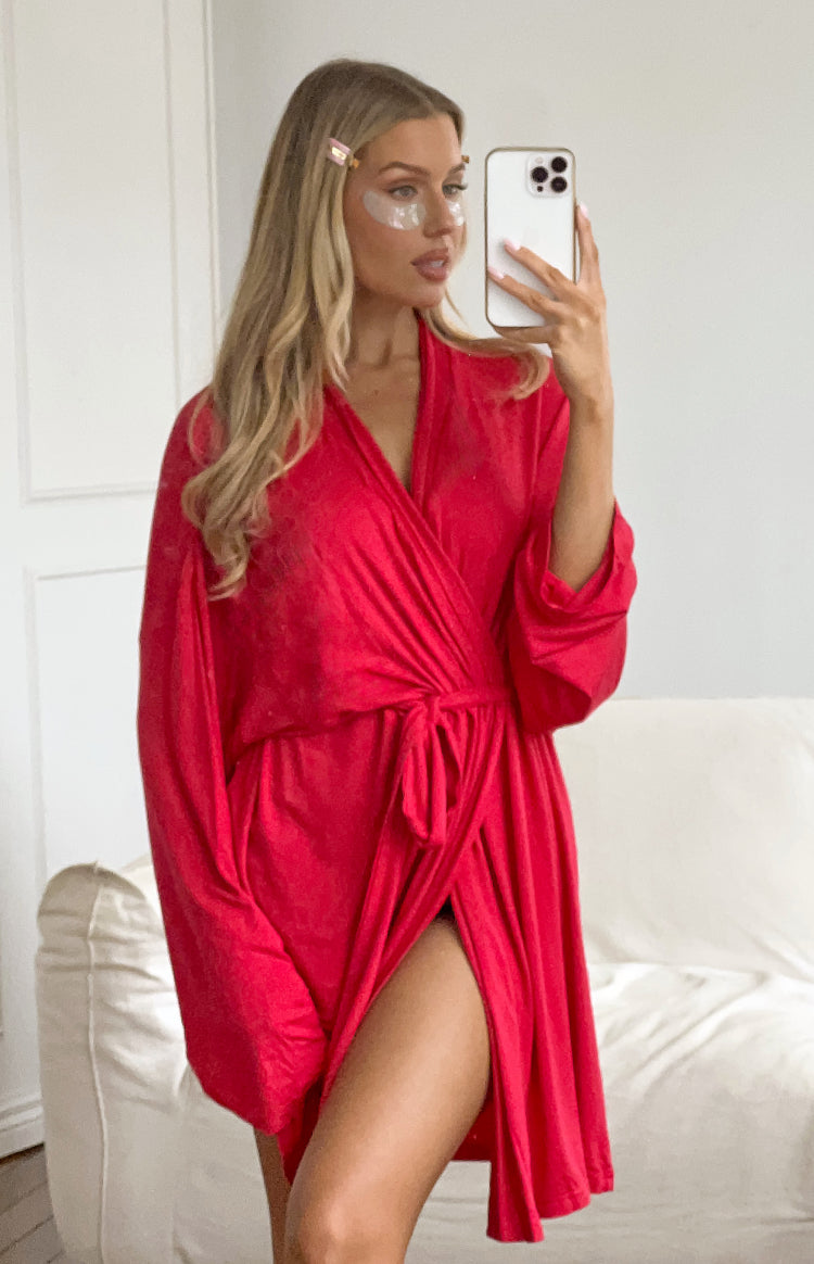 Beginning Boutique Almost Ready Burgundy Robe burgundy wrap robe with a V-neck, tie waist, and long relaxed sleeves