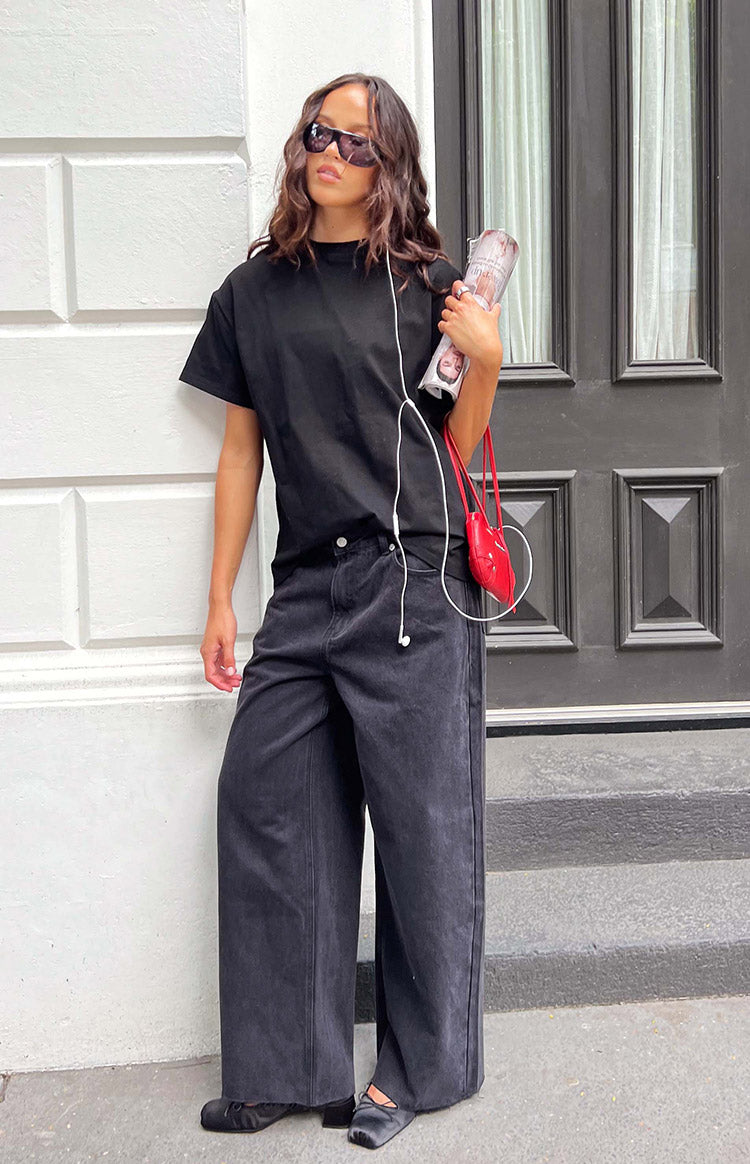 Beginning Boutique She's Yours Black Wide Leg Boyfriend Jeans washed black wide leg boyfriend jeans with a relaxed fit