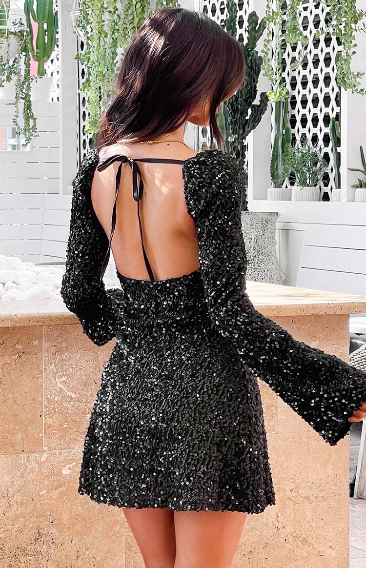Beginning Boutique Marienne Black Velvet Sequin Long Sleeve Mini Dress black velvet sequin long sleeve mini dress with open back and velvet tie