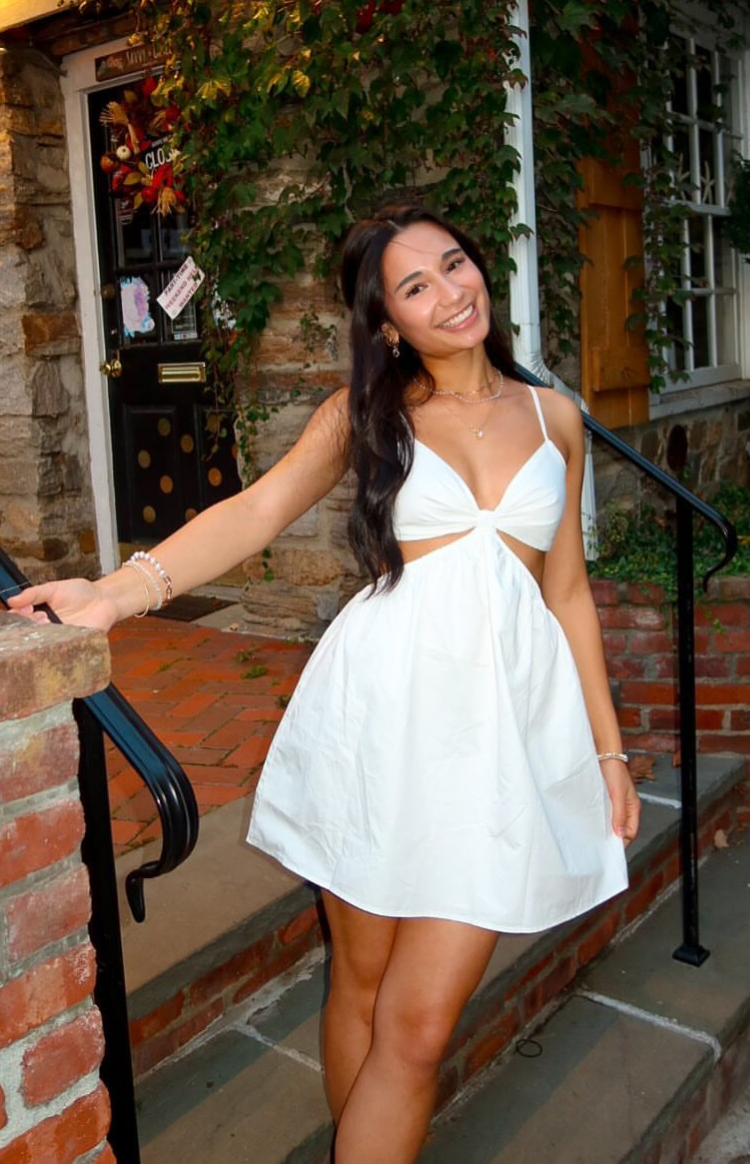 Beginning Boutique Amorgos White Mini Dress white V-neck mini dress with spaghetti straps, twisted bust detail, and waist cutouts