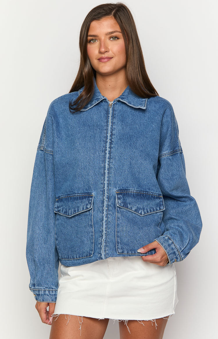 Beginning Boutique Abigail Mid Wash Denim Bomber Jacket mid wash denim collared full zip bomber jacket with two front flap po