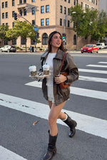 Vintage brown PU bomber jacket with an oversized, relaxed fit and wide collar