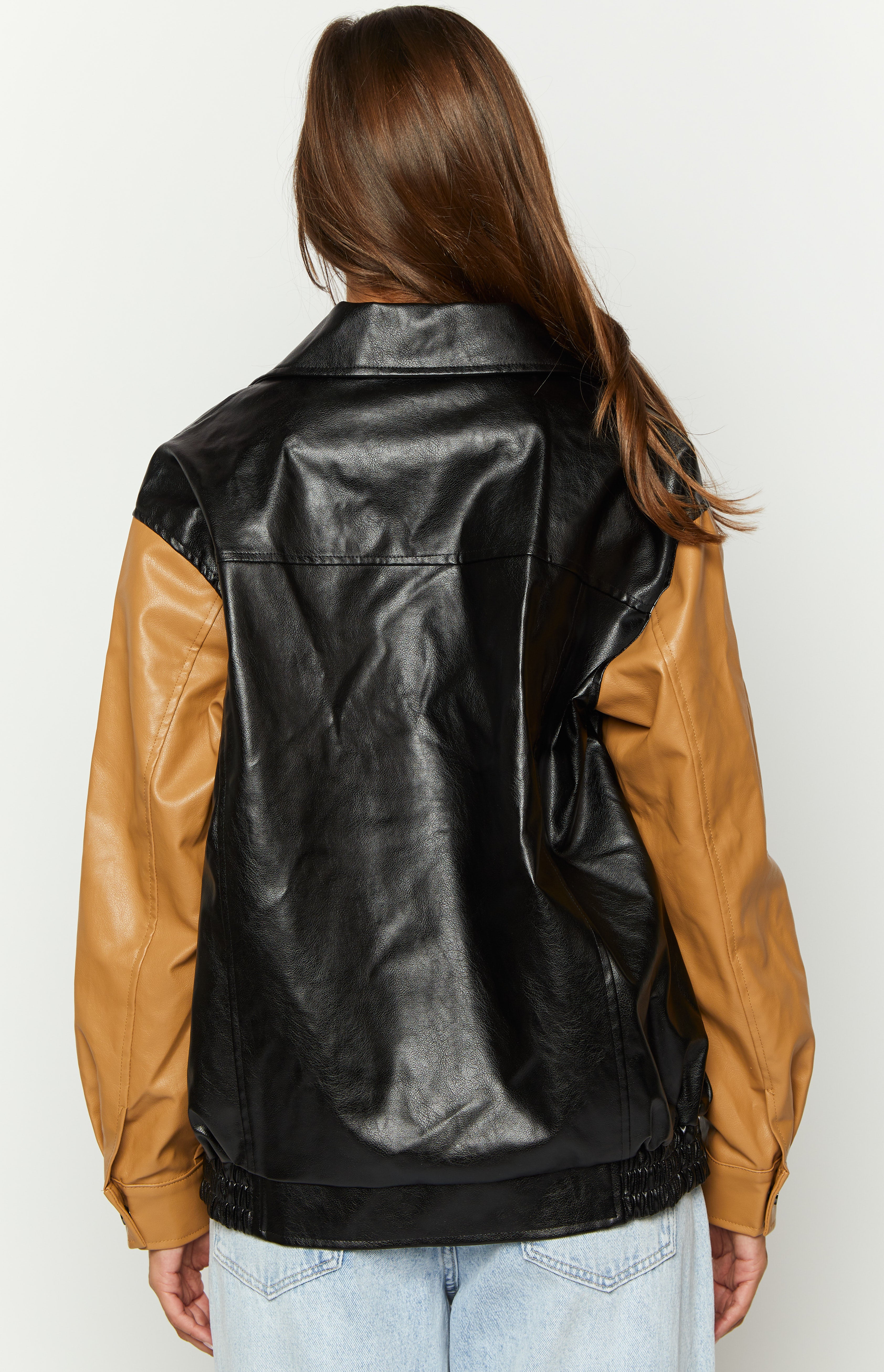 Rear view of a black and brown contrast PU bomber jacket with a collar and ribbed hem
