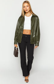 Olive PU bomber jacket worn open, showing the wide collar, front zipper, and ribbed cuffs