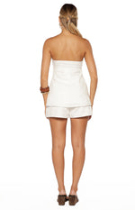 Rear view of white floral embroidered shorts with a relaxed fit