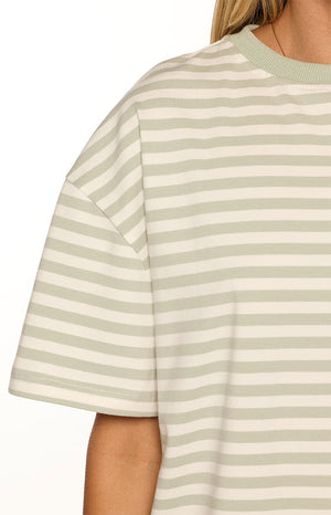 Detail shot of the sage stripe tee's ribbed crew neck and dropped shoulder short sleeve