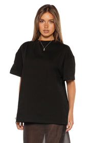 Front view of a black crew neck tee with relaxed short sleeves and a loose fit