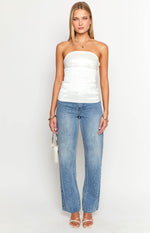 Front view of a white strapless top with a fitted bodice, visible seams, and a slight A-line flare at the hem