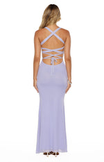 Rear view of a lilac mesh maxi dress with criss-cross back straps, a tie-up detail, lower back cutout, and scalloped hem