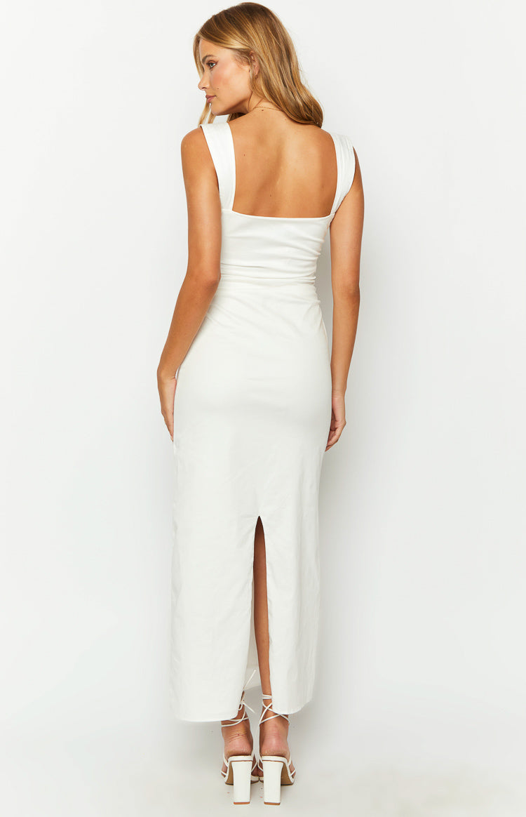 Rear view of a white maxi dress showing the square back neckline, wide straps, and back slit