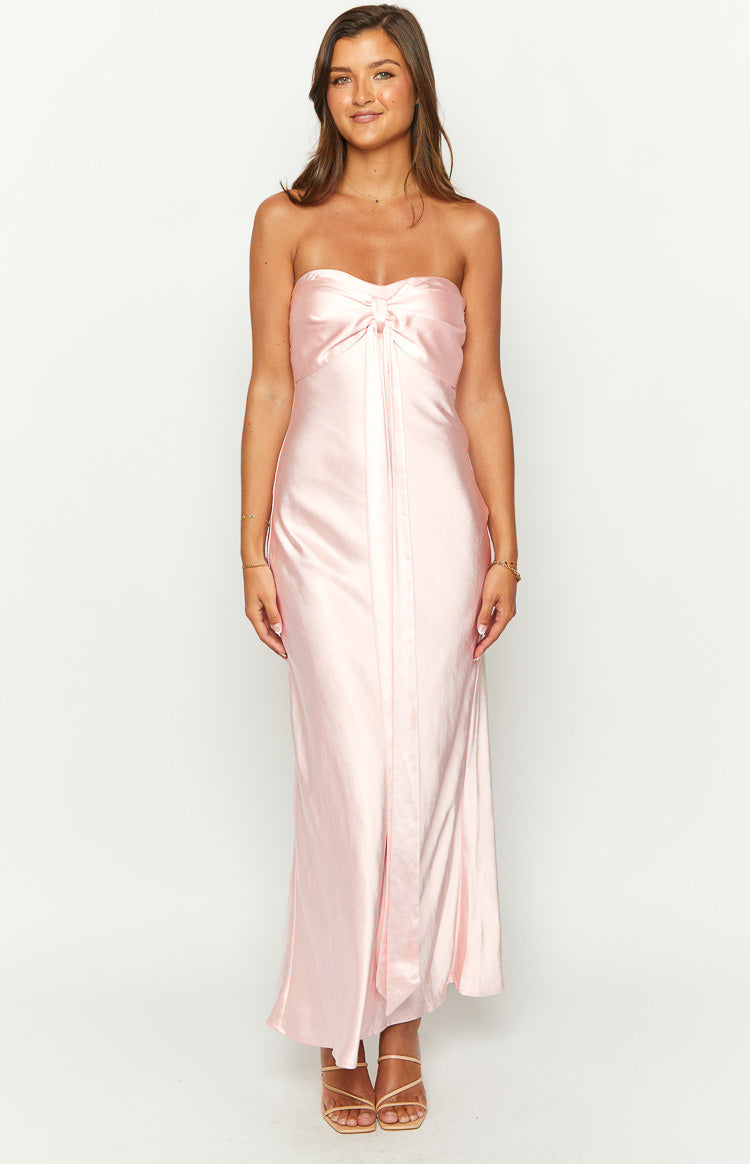 Pink satin strapless maxi dress with a bow detail on the bust and a central vertical panel