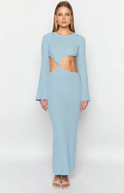 Front view of a light blue knit maxi dress with cutout waist and twisted knot detail, round neck, and long flared sleeves