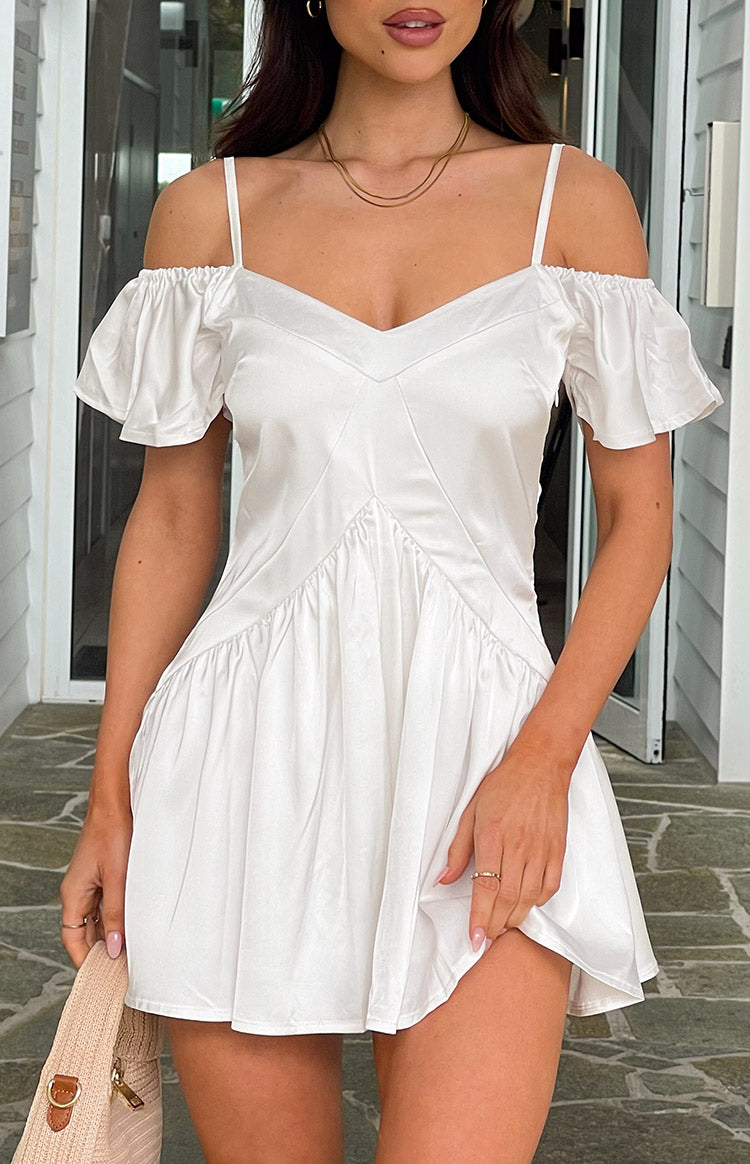 White satin playsuit with off-shoulder puff sleeves, V-neck, and gathered V-seam detail at the waist