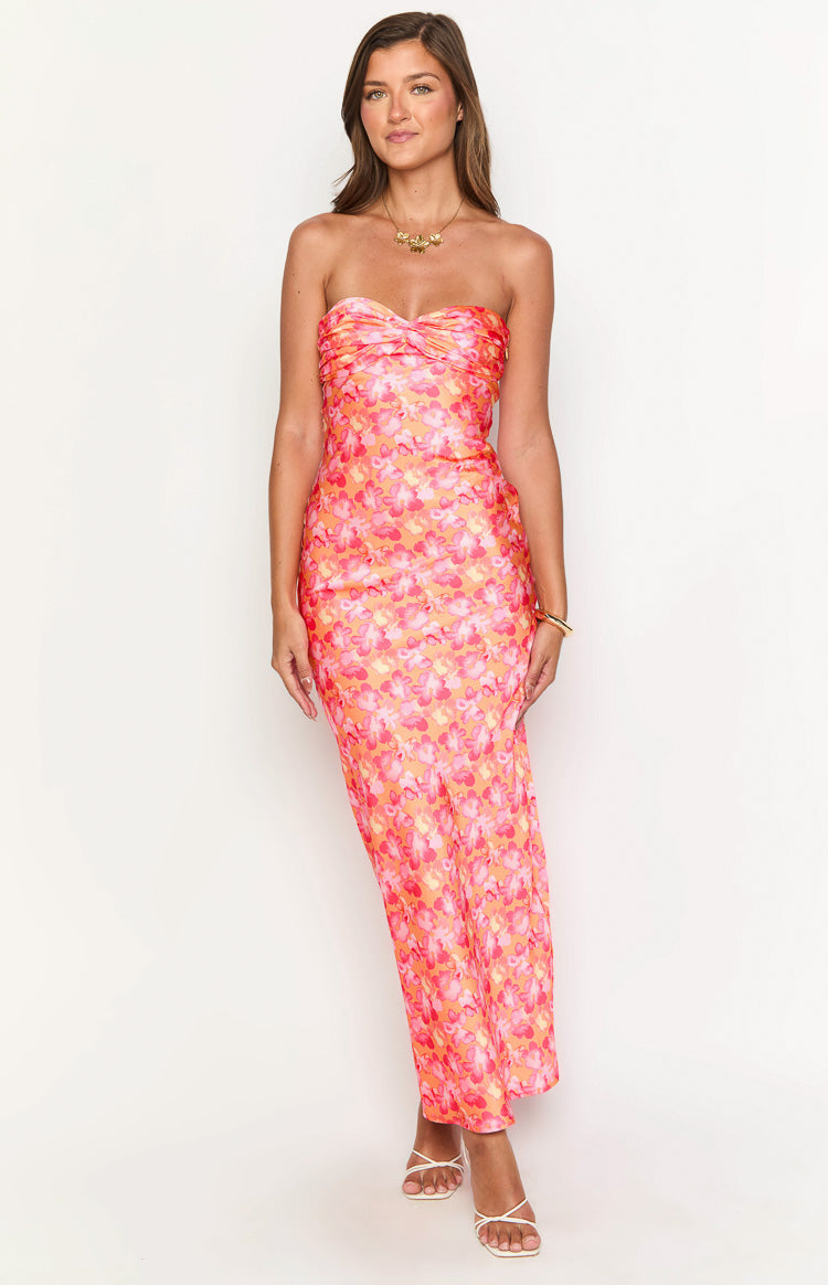 Front view of a pink and orange floral strapless maxi dress with a ruched bust and fitted silhouette