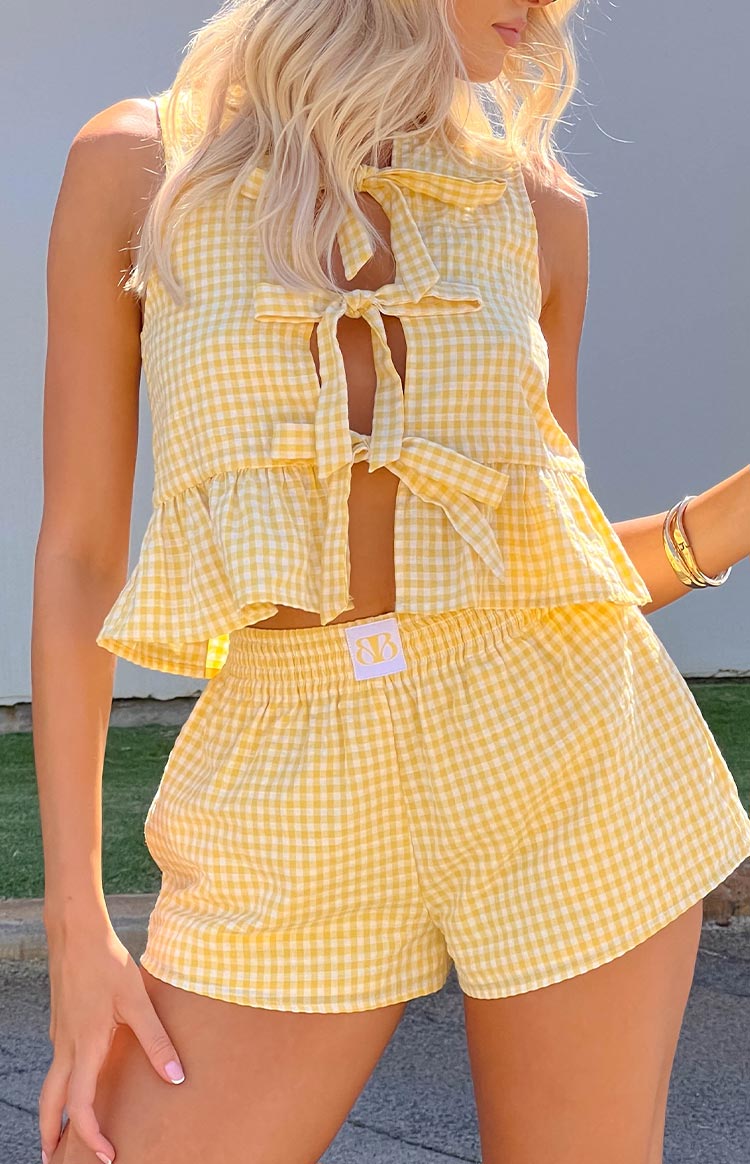Beginning Boutique Baxter Yellow Gingham Shorts yellow and white gingham mini shorts with an elasticated waist