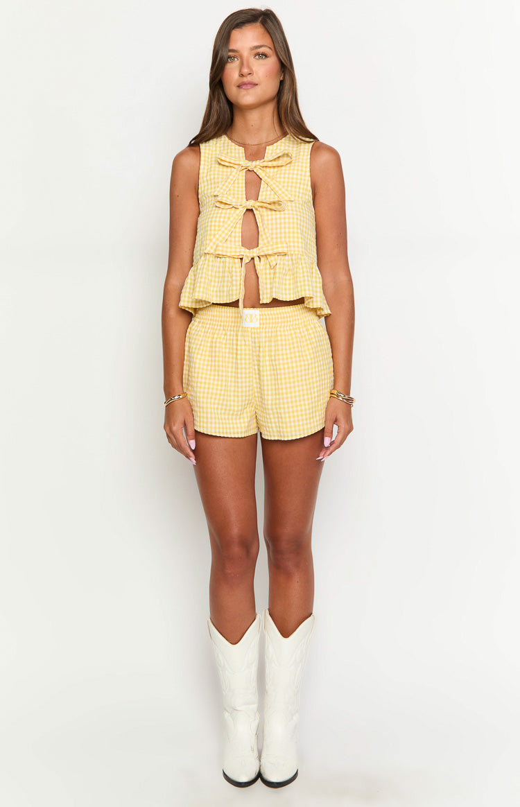 Yellow gingham mini shorts with a comfortable elasticated waist and small front label