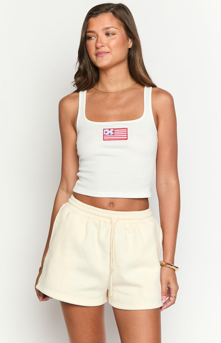 Cream lounge shorts with an elasticated drawstring waist and relaxed fit
