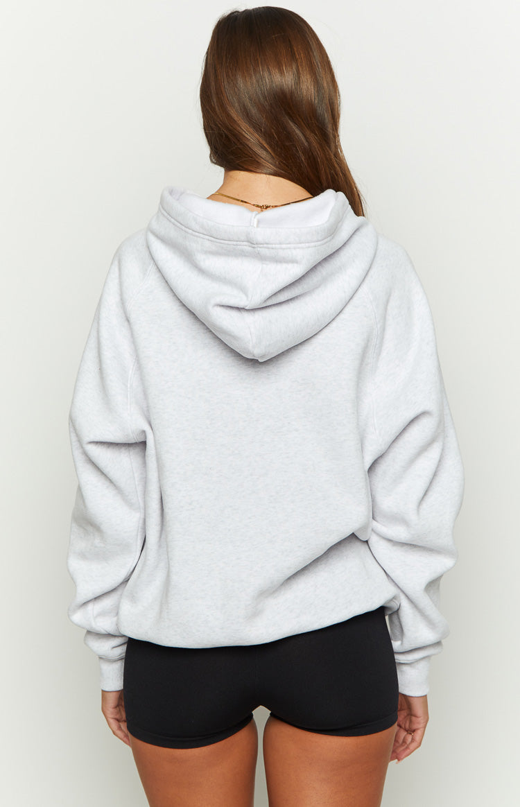 Rear view of a grey marl oversized hoodie with a large hood and raglan sleeves