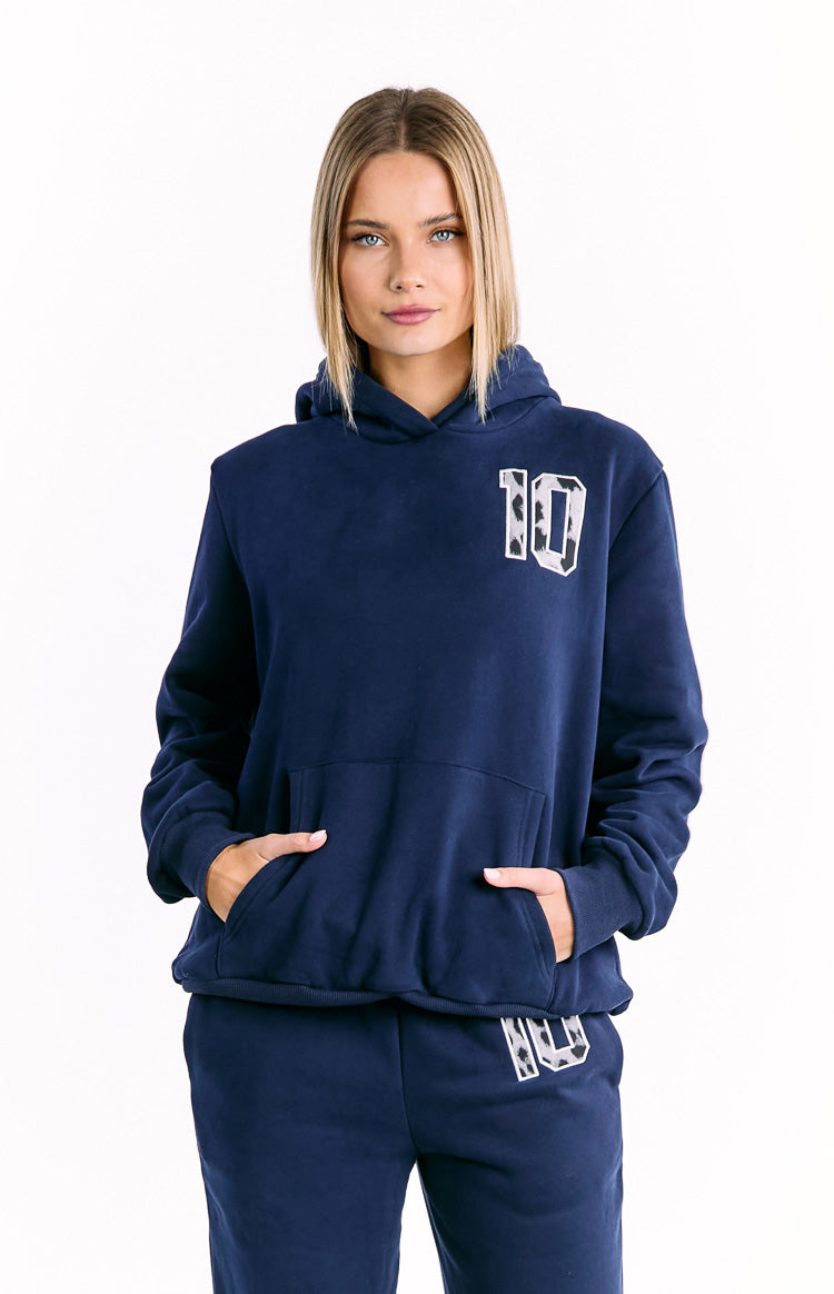 Front view of a navy hoodie with a white and grey leopard print '10' graphic on the chest and a kangaroo pocket