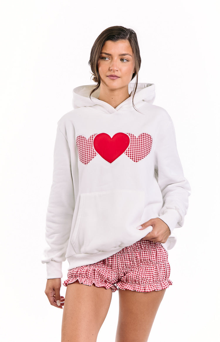 Beginning Boutique Beginning White And Red Heart Hoodie white oversized hoodie with red and white gingham hearts and a red heart