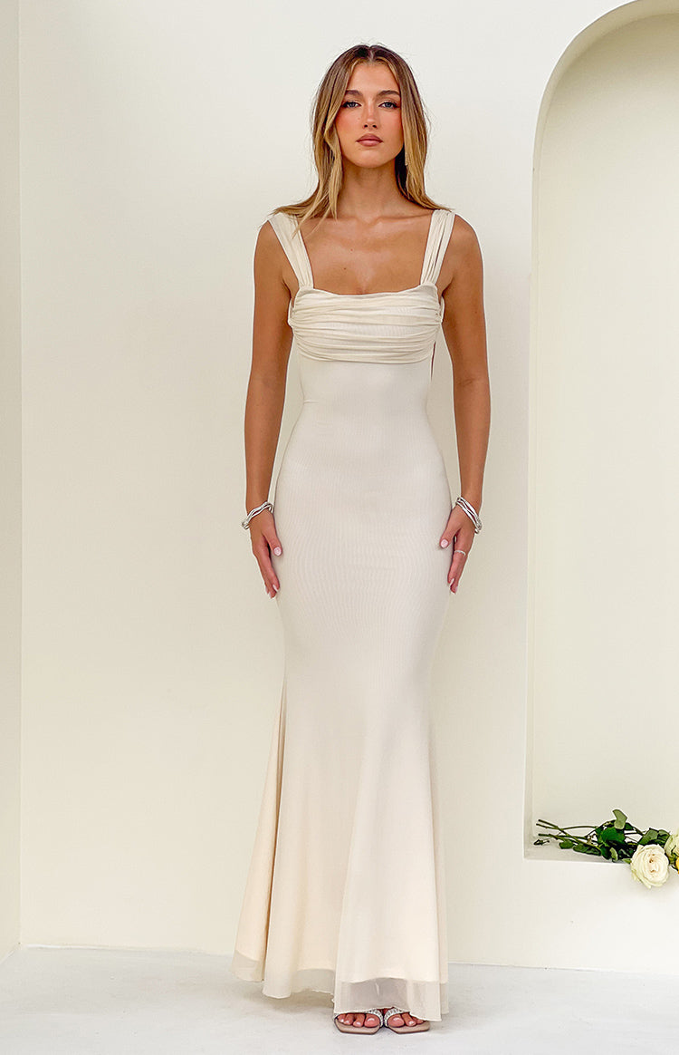 Cream mesh maxi dress with a square neckline, ruched bust detail, wide gathered straps, and a fitted silhouette