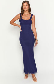Navy mesh maxi dress with a square neckline, ruched wide straps, and a fitted silhouette with a flowy hem