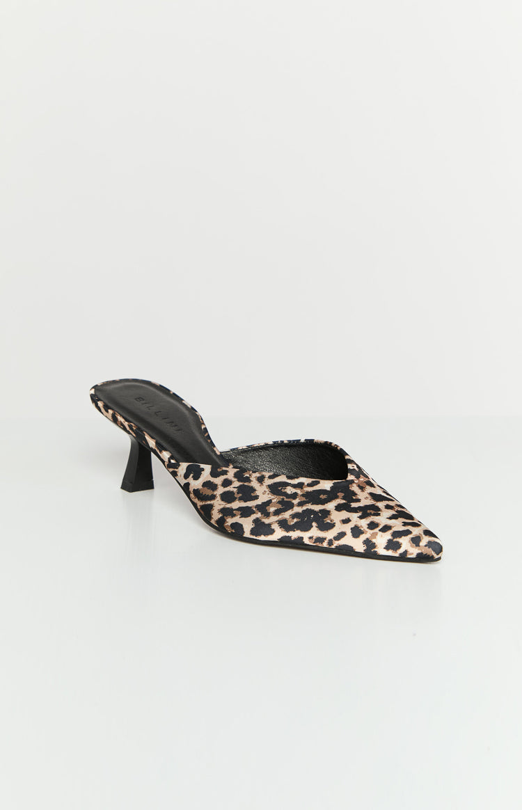 Side view of a leopard print mule heel with a pointed toe and a flared black block heel