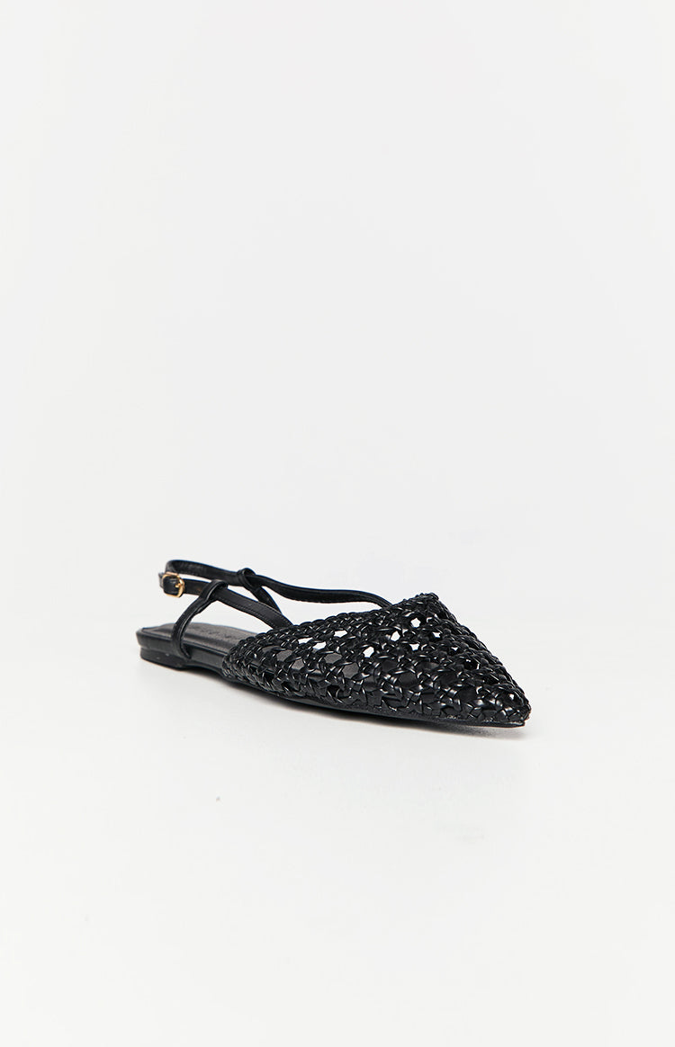 Black mules with closed pointed toe.