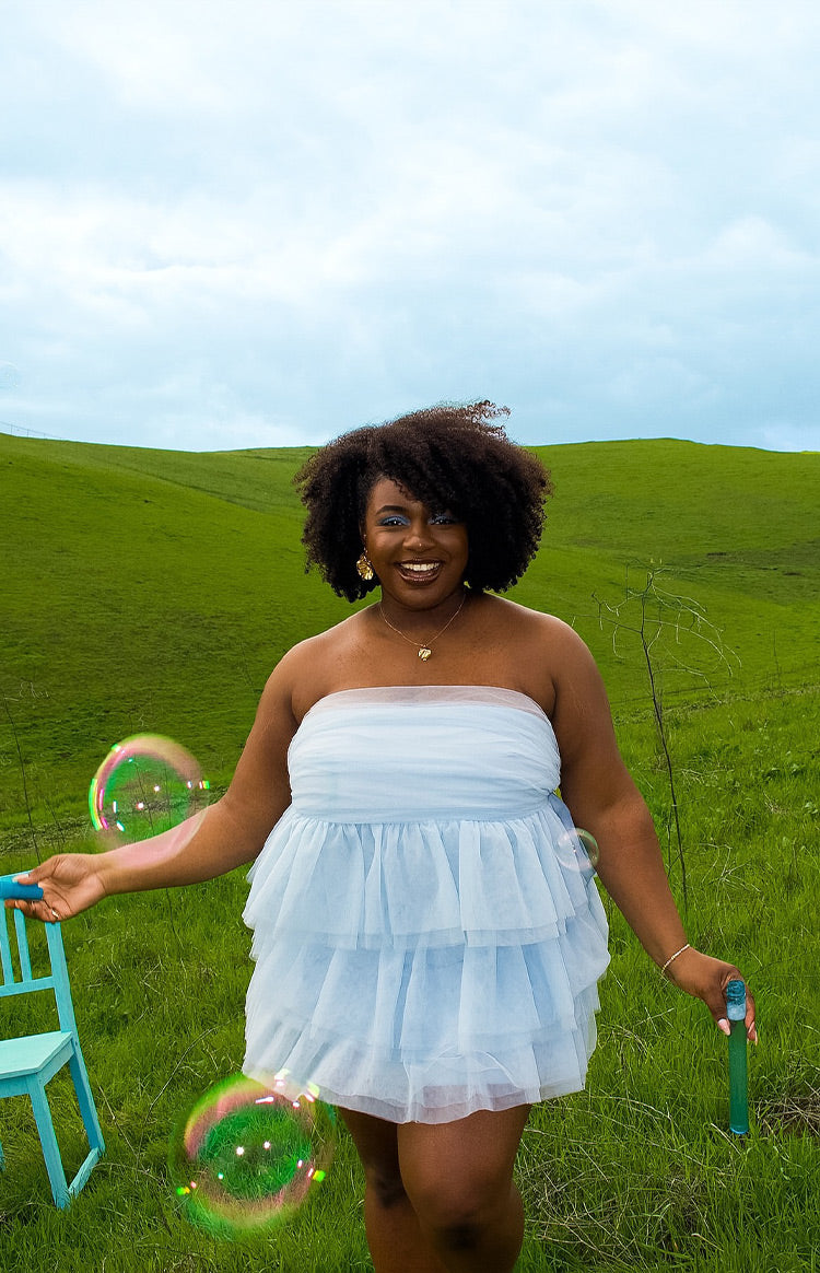 Light blue strapless mini dress with a ruched bodice and tiered tulle skirt