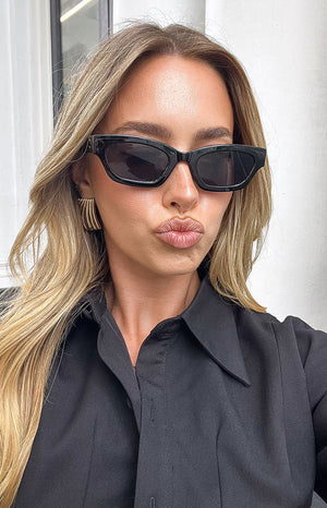 Beginning Boutique Black Slimline Sunglasses black slimline rectangular sunglasses with dark lenses