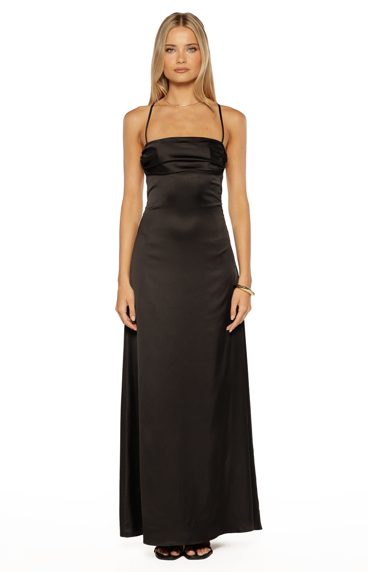 Front view of a black satin maxi dress with a straight neckline, thin spaghetti straps, and a flowing skirt