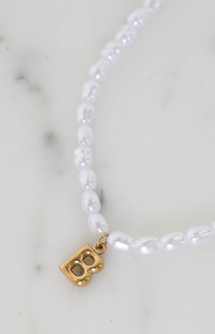 Beginning Boutique Bodie Pearl Gold Initial Letter Necklace white irregular pearl necklace with gold initial B charm