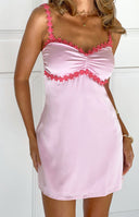 Beginning Boutique Breige Pink Flower Satin Party Mini Dress light pink satin mini dress with ruched bust and pink flower tri
