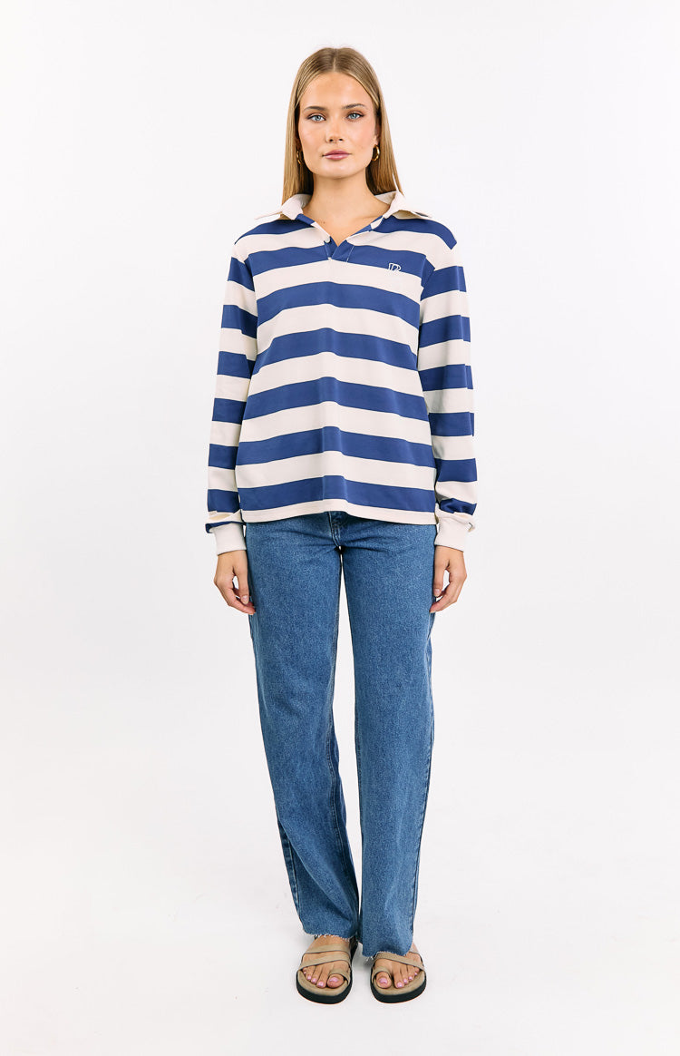 Relaxed blue and cream striped jersey with a white pointed collar, V-neck, and small chest logo