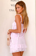 Pink chiffon mini skirt with a tiered ruffled hem