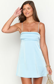 Front view of a light blue mini dress with a square neckline, thin spaghetti straps, and horizontal pleating across the bust