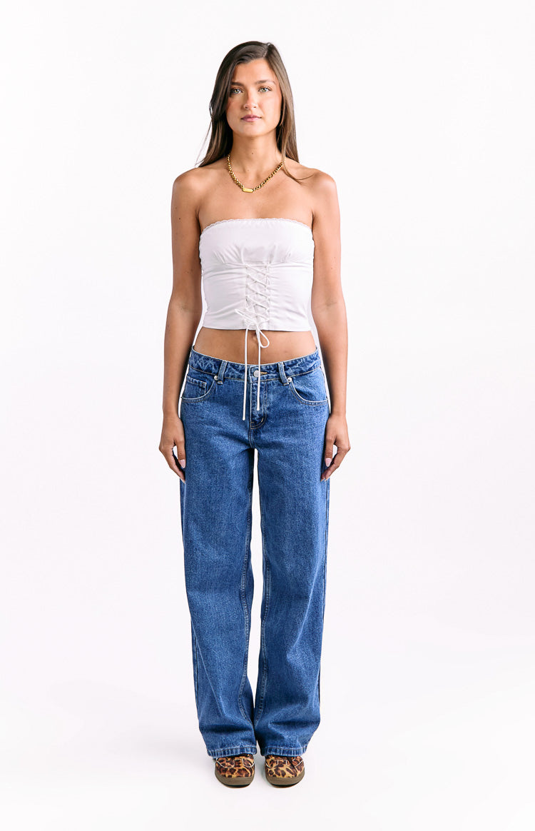 Mid-wash blue low-waist baggy leg jeans with a relaxed fit and classic five-pocket design
