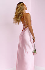 Rear view of a pink satin maxi dress with a delicate criss-cross lace-up back and long ties