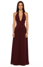 Front view of a burgundy maxi dress with a deep V-neck halter and a flowy pleated skirt