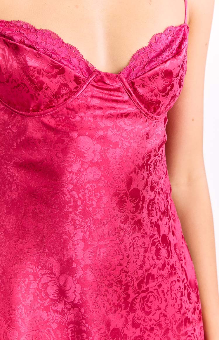 Close-up of the pink floral jacquard satin dress with lace trim and underwired cups on the bust