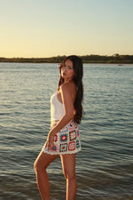 Beginning Boutique Davina White Crochet Mini Skirt white crochet mini skirt with colourful granny square pattern and scallope