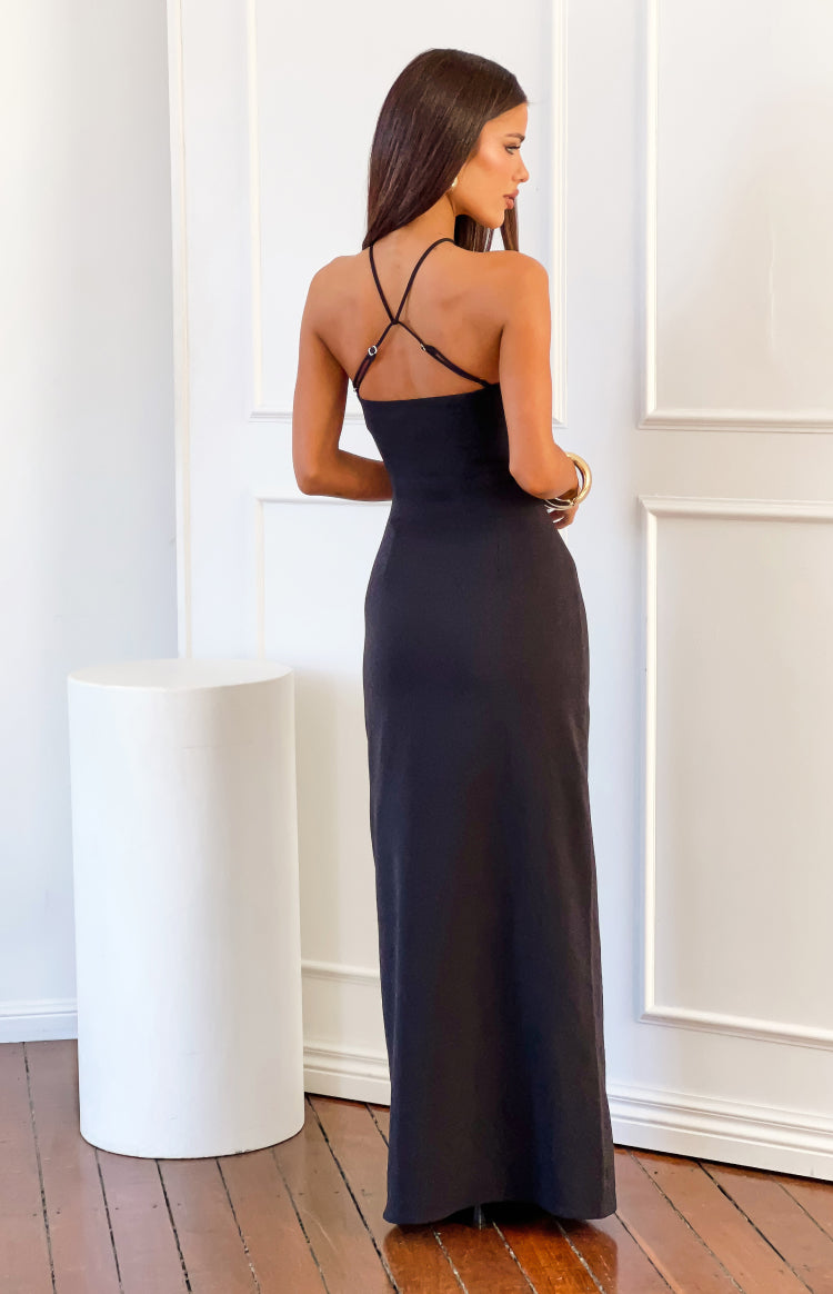 Rear view of a black crepe maxi dress with criss-cross spaghetti straps and a low scoop back