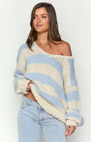 Light blue and cream striped chunky knit sweater with a wide off-shoulder neckline