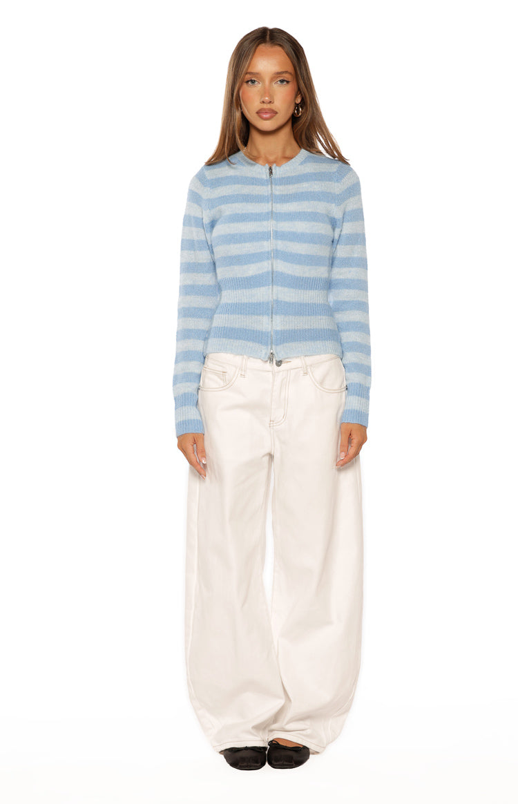 Front view of a blue and light blue striped knit sweater with a full zip front and crew neckline