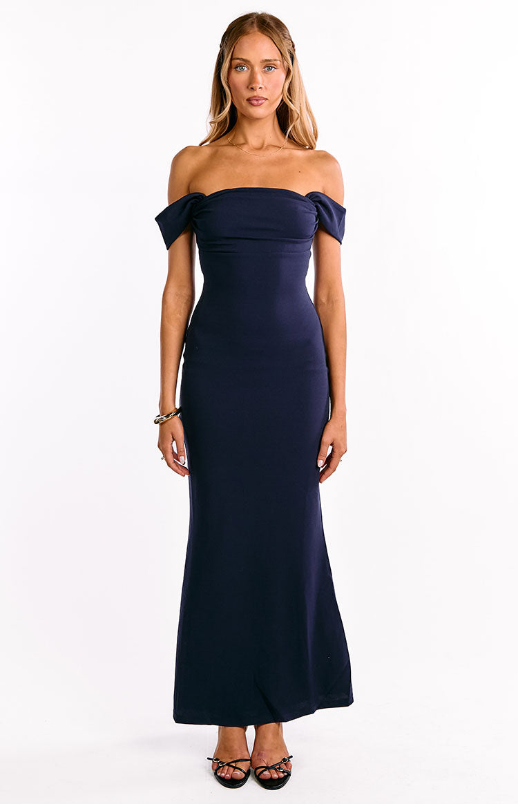 Navy crepe maxi dress with a fitted bodycon silhouette and draped off-shoulder sleeves