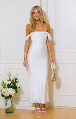 Full length white formal dress with a draped off-shoulder neckline and a sleek, fitted silhouette