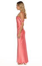 Side view of a pink satin formal dress with a draped off-shoulder neckline and a fitted silhouette flowing into a straight skirt