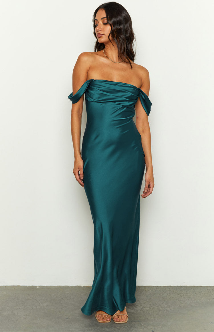 Teal satin off-shoulder maxi dress with a draped cowl neckline and a flowing skirt