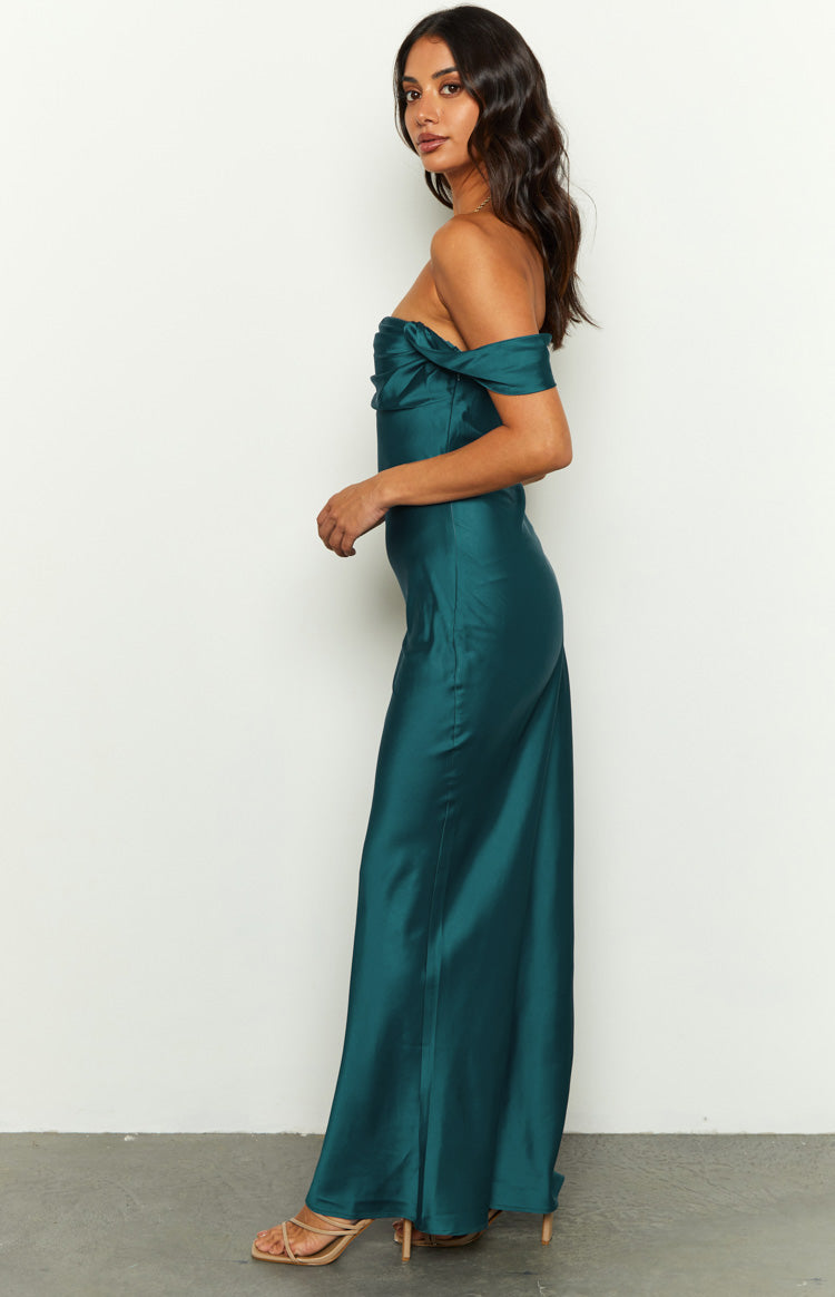 Side view of a teal satin off-shoulder maxi dress showing the fitted bodice and flowing skirt