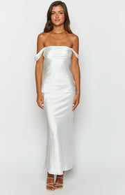 White satin off-shoulder formal dress with a draped neckline and a flowing midi skirt